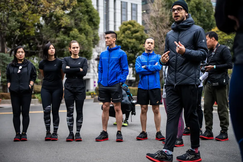 Chevy Rough delivering a seminar to ASICS runners in Tokyo